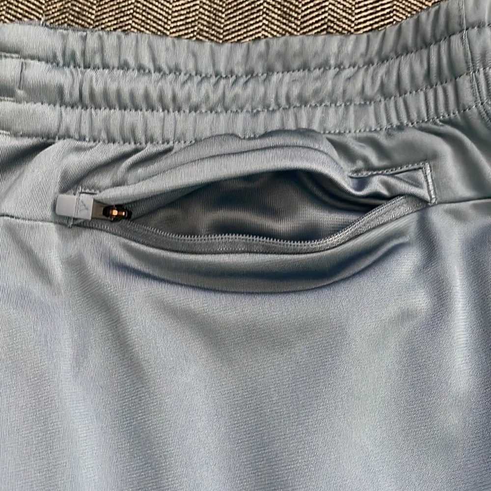 Adidas Men’s Joggers. Blue/grey color with black stripes.